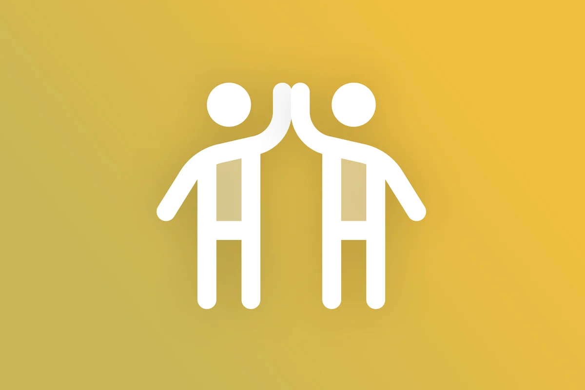 Icon of two people giving a high‑five on a yellow background.