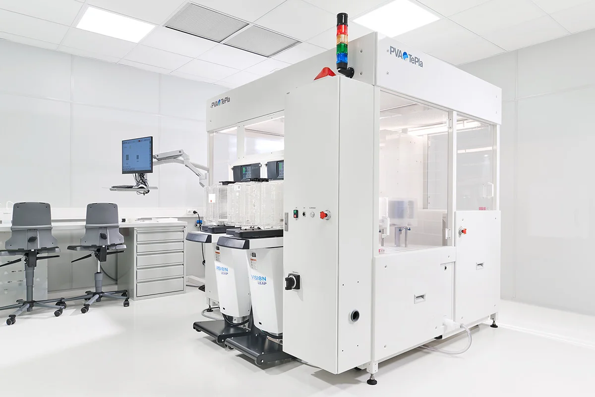 Wafer surface measurement system with enclosed chamber, robot arm, and control workstation.