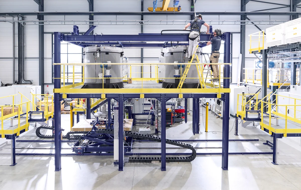 Fluoride ion cleaning system with multiple process modules in an industrial facility